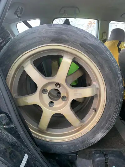 $700 obo 4 x mags 215/40 R17 Off Honda 4 bolt pattern for japan imports Tires are included for free...