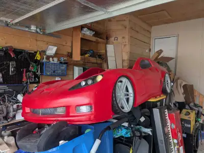 Double mattress Corvette car bed.Head light works. It's coming from a smoke-free pet-free home. It h...