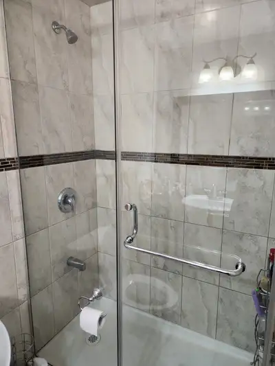 1 bedroom partially furnished basement apartment with ensuite bathroom, kitchen and sitting atea