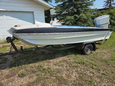 Older fiberglass boat Trailer is a excellent 105 HP motor running V haul Don't leak