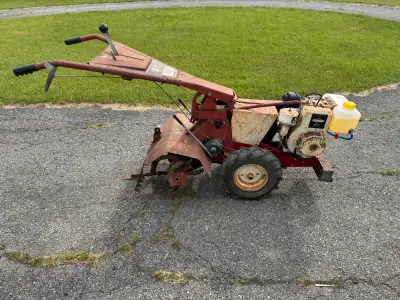 MTD 8HP rear-tine garden tiller with a dependable Briggs & Stratton engine. This unit is self-propel...