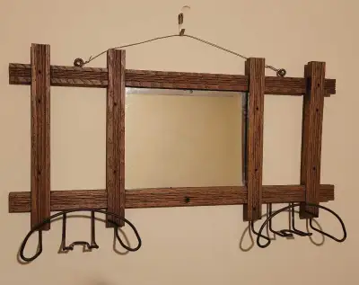 Antique oak wall mirror with metal hangers. In good condition. Pick up is right between birds hill t...