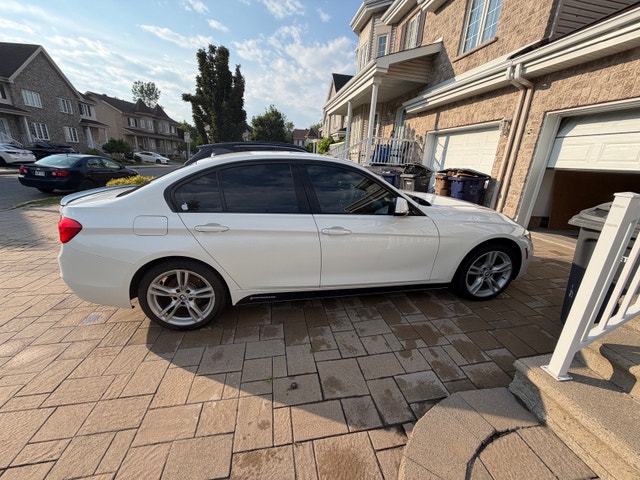 BMW 320i xdrive sedan — photo 4