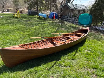 I'm selling a beautiful 1910 double row skiff, perfect for enjoying calm waters with a touch of hist...