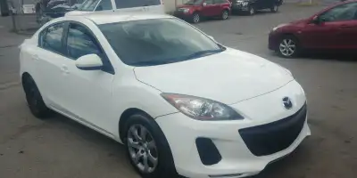 FOR SALE: LADY OWNED 2013 MAZDA 3 GX SEDAN. WHITE AUTOMATIC, FULLY LOADED. WELL MAINTAINED. ABS. AC....