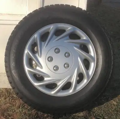 Set of 4 winter tires Excellent condition Size 235 65 17 INCLUDES winter wheels, covers $1500