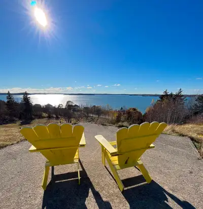 An acre overlooking the Bay of Fundy. Sewer, driveway, electric, well and 12x20 cement slab complete