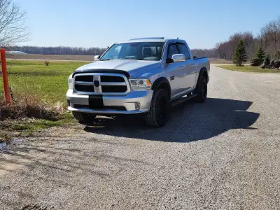 2018 Ram Sport. Rebuilt title. Can come with Decked Storage Box and topper. Topper is black. May con...