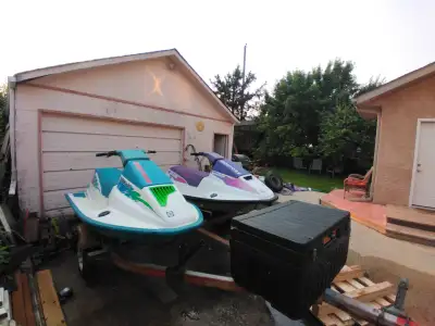 1991 SEADOO SP, 1992 SEADOO SPX, NORTH COUNTRY TRAILER, TWO LIFE VESTS.
