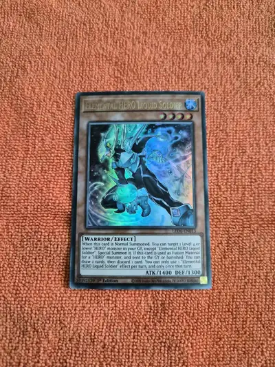 Read Bio | Elemental HERO Liquid Soldier (1ST Edition), View more