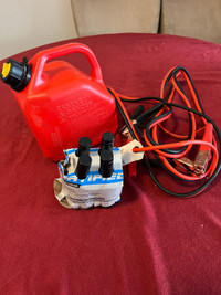 Booster cables, 1 gallon gas container and gas line antifreeze 