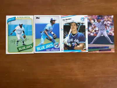 $20.00 for all 4 WORLD SERIES CHAMPS cards - Shipping available - Located at Pape ave & Cosburn ave...