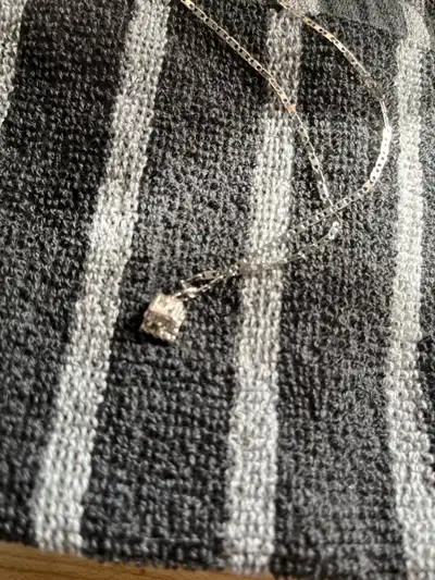 New sterling silver charm made like an engagement ring in a box purchased in the 1980's in Nassau, B...