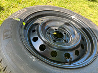 One Michelin summer tire - new with new rim, $60. Good for spare
