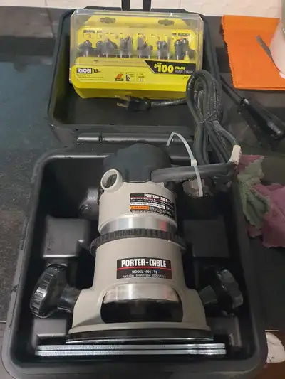 Porter Cable Router and 15 piece Ryobi router bit set, View more