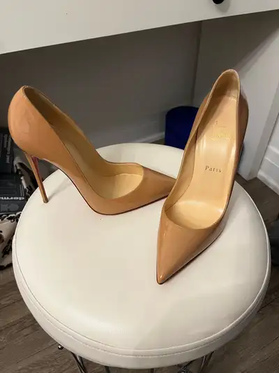 Brand new beige pumps with red soles, size 39.5. Pickup Newmarket