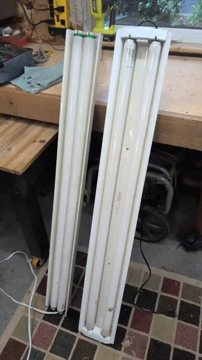 Two 48" florescent light fixtures , View more