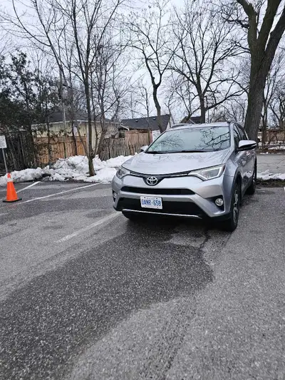 2016 Toyota Rav4 LE, cracked front windshield.