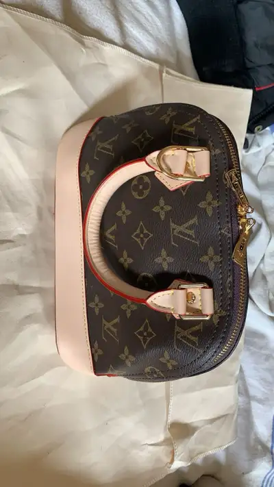 Louis Vuitton Alma bb, View more