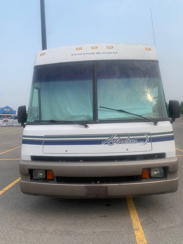 Winnebago adventurer 32 feet long fully loaded safety included RVs