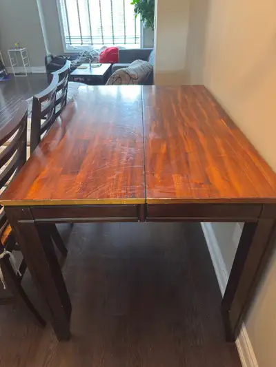 Wooden dining table and chairs, View more