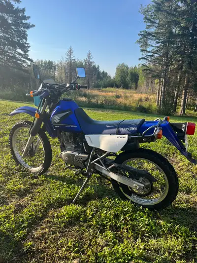 2005 Suzuki DR200. Great bike for trails or the city. Good fun bike easy to ride for any age. It has...
