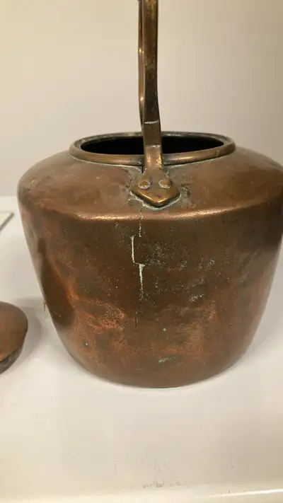 Antique copper kettle, unique stitching to seal the copper, in good condition. Call Terry 289-946-17...