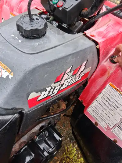 1997 big bear Runs great Needs brakes adjusted. 2 extra tires on rims