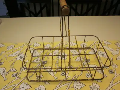 Vintage milk bottle carrier Holds 6 bottles Was yellow, but the paint is chipping, age of the item C...