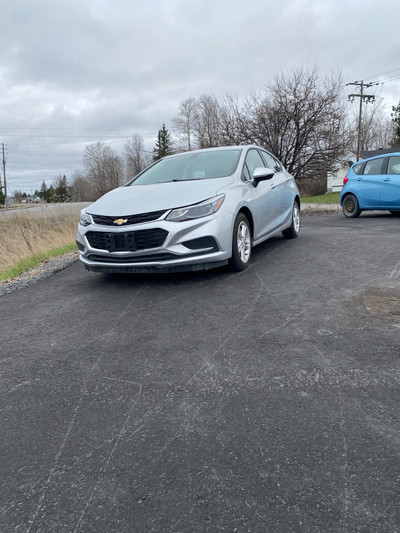 Chevy Cruze lt hatch back with a winter set of tires