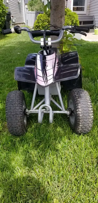 This Razor 24V dirt quad is perfect for young adventurers, offering electric-powered fun with a rugg...