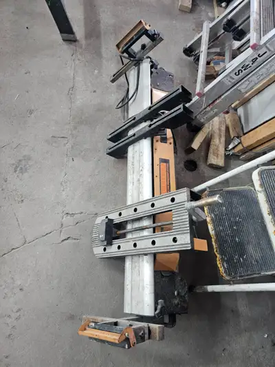 Heavy-duty work stand for miter saw or similar tools., View more