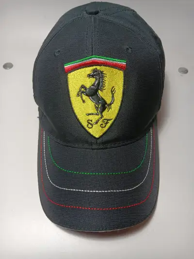 Brand new, black Ferarri cap, never worn.Genuine Official Licensed Ferarri Merchandise. One size adj...