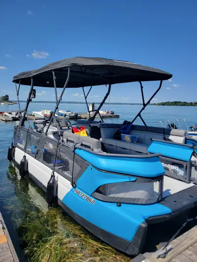 21 ft, 230 HP Seadoo Switch tritoon boat. Includes a , double bimini, a sport tow bar, an upgraded m...