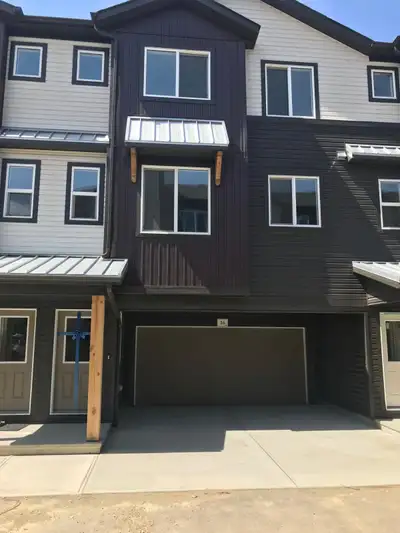 Modern 1,600 sq. ft. townhouse built in 2018 featuring 3 bedrooms and 2.5 bathrooms. This home offer...