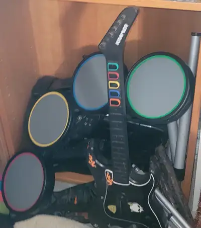 Guitar hero drums and guitar controllers. Gaming. I deliver!, View more