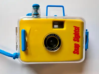 Works perfectly (tested, cleaned, restored). Feels like a disposable camera, but you can reload it w...