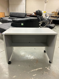 Grey roll out desk