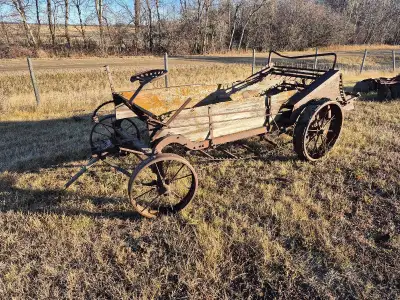 Antique manure spreader. Being sold as yars decor or as a restoration project. The wood floor is gon...