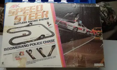 VERY RARE AFX Speed Steer "BOOMERANG POLICE CHASE" Slot Car Set, View more