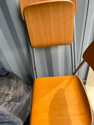 Wooden Seat folding chairs. Great for a breakfast counter or a nook. Two available. $20 each. PLEASE...
