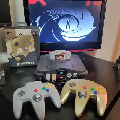 Nintendo 64 bundle with Goldeneye, 2 controllers, and power/video cords. Everything you need to star...