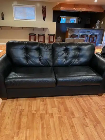 Faux black leather couch, love seat and chair. Selling as a set.