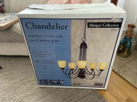 Marigot Collection espresso Chandelier with amber glass shades
