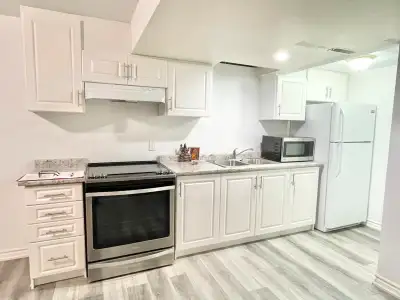 RENOVATED LEGAL UNIT: ONE BED AND DEN APARTMENT