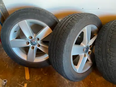 Aluminum wheels from a 2012 Jetta with 205/55/16 tires. Also never used spare tire for same vehicle...