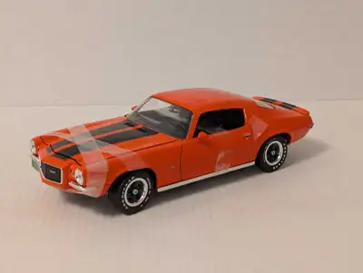 ERTL American Muscle 1/18 1970 1/2 Chevrolet Camaro Z28 with opening parts in orange. The model is n...
