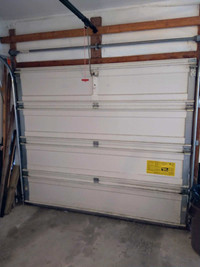 Two used Garage Doors