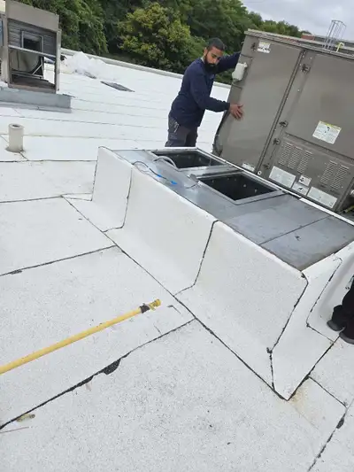 flat roof repair and replacement services, View more