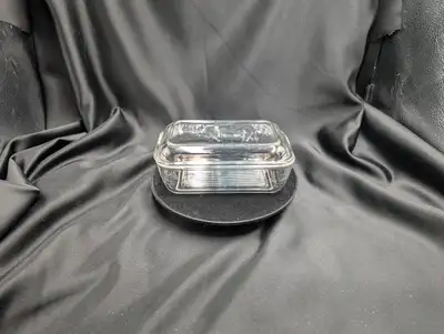 An Arcoroc cow butter dish, a vintage piece of glassware made by the French company Arcoroc. This pa...